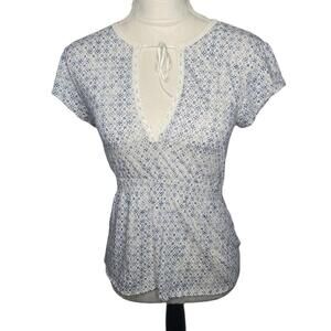 Polo, by Ralph Lauren. Peplum, Floral Print, Short Sleeve Top. Size Medium